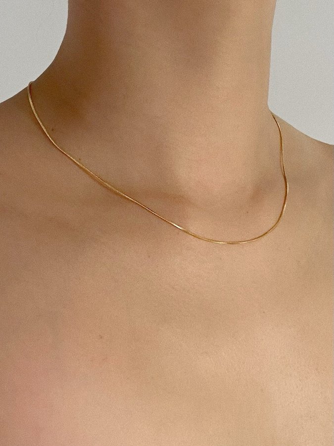 Halsband i stål med 18k guld med ormkedja 1 mm