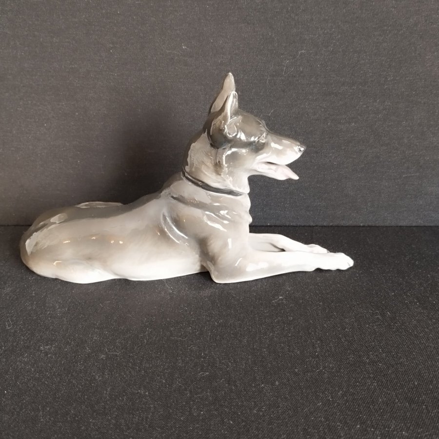 Gebrüder Heubach Porzellan Figur - Liegender Deutscher Schäferhund