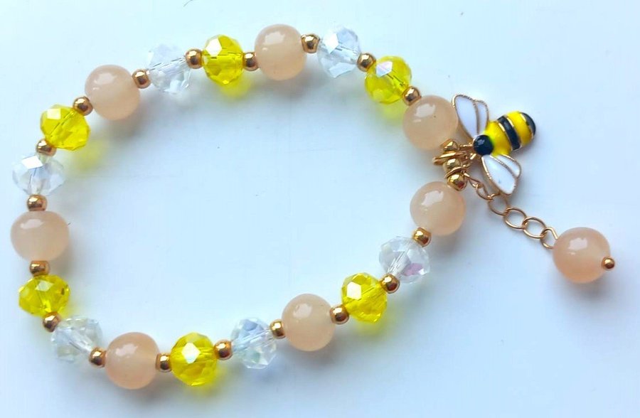 Beautiful breclet yellow and white crystel beads whit small be