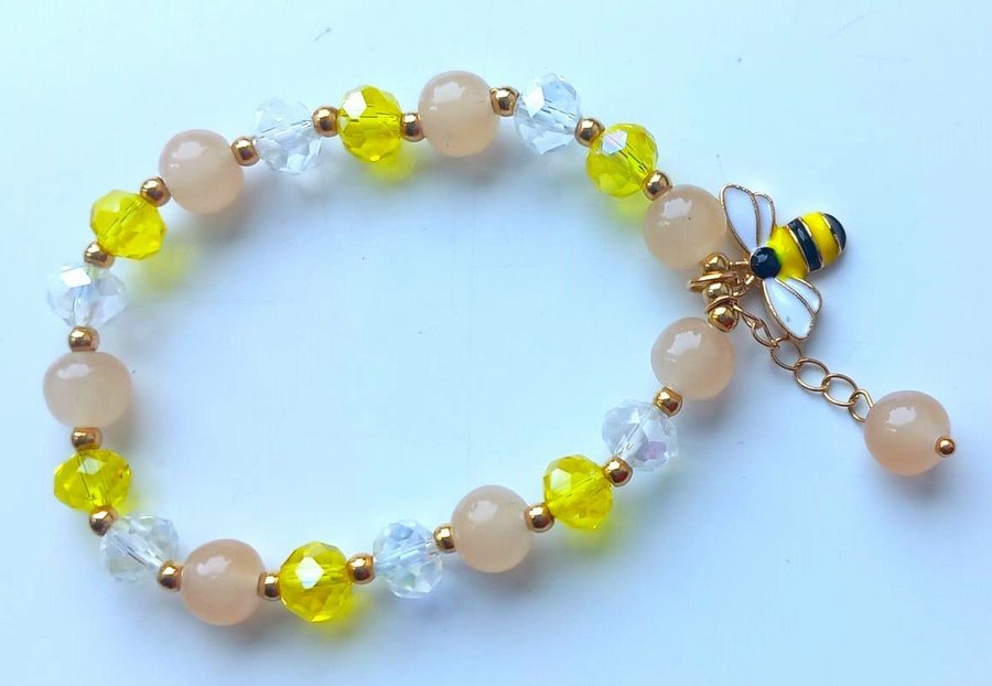 Beautiful breclet yellow and white crystel beads whit small be
