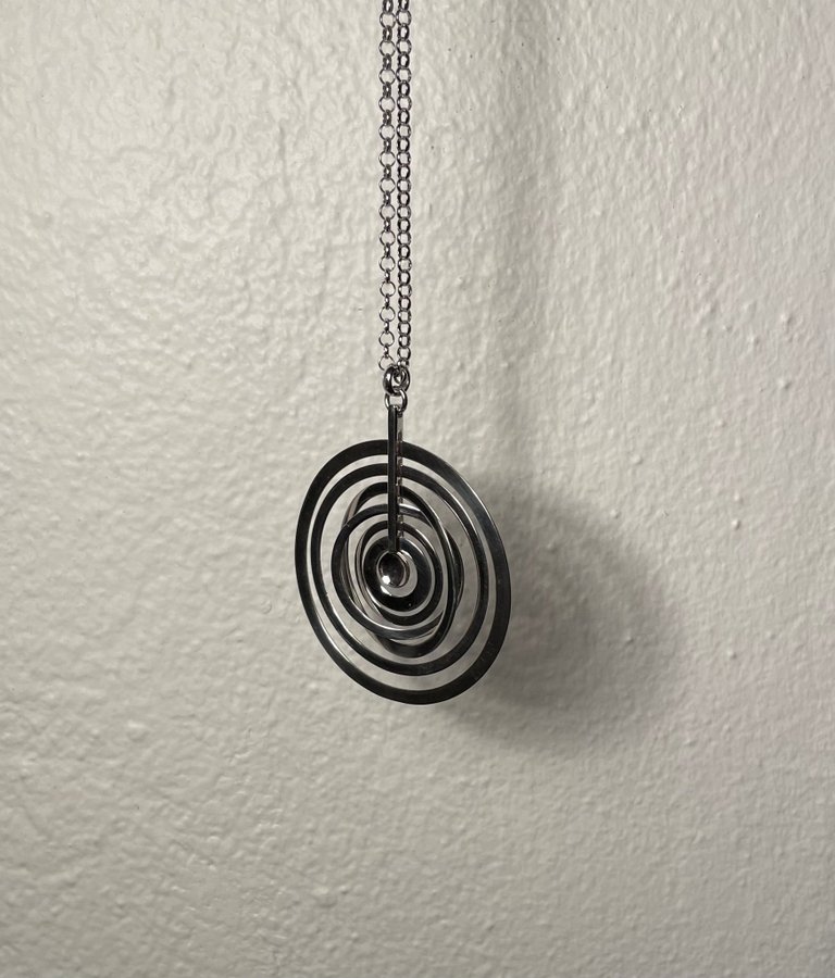 Tapio Wirkkala: Modernist Silvermåne i Sterling Silver