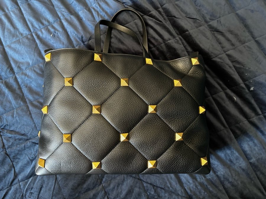 Roman stud quilted tote