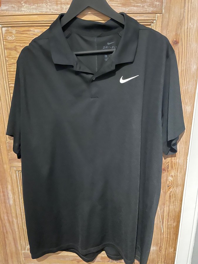 Nike svart golf piké storlek XL