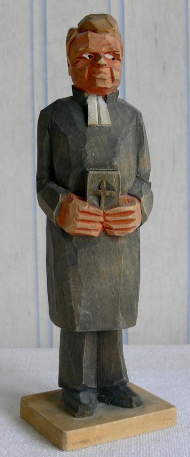 Blottande präst gammal figurin i trä