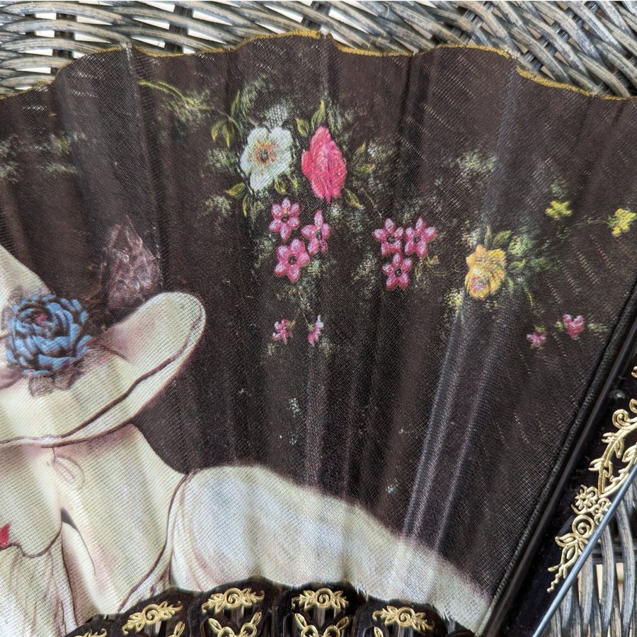 Vintage solfjäder med kvinno profil och blommor
