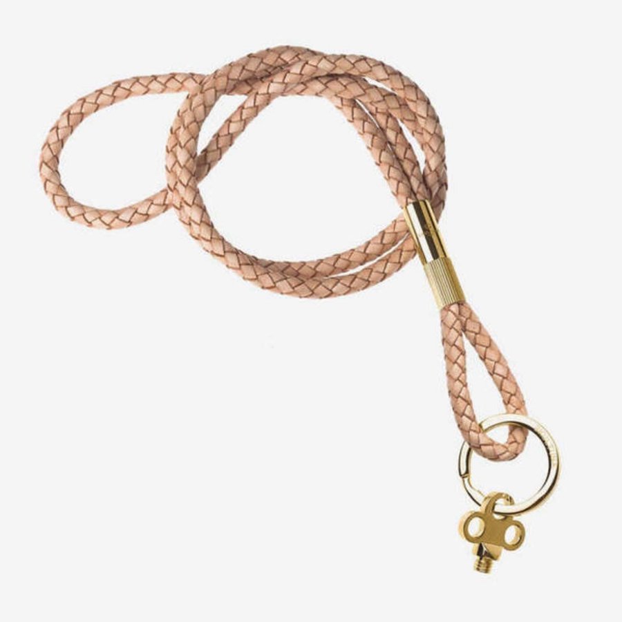 Skultuna gold/ leather keychain and necklace