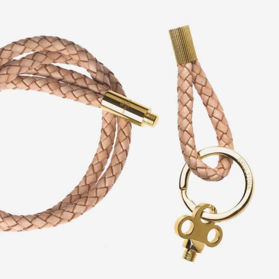 Skultuna gold/ leather keychain and necklace