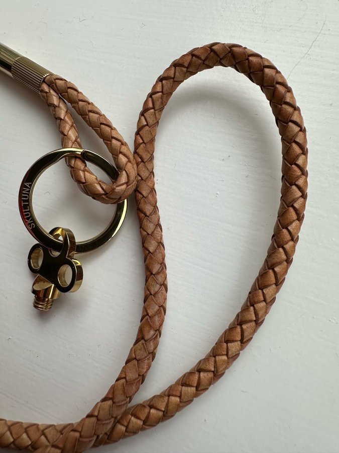 Skultuna gold/ leather keychain and necklace