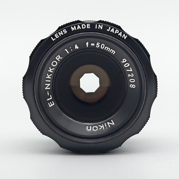 Nikon EL- Nikkor 50 mm f/4 objektiv i originalask nummer 907208