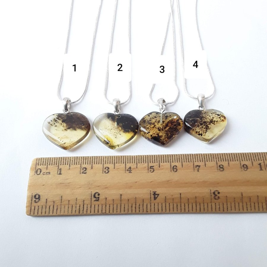Baltic amber gemstone Heart pendant on a silver color chain Heart with insect
