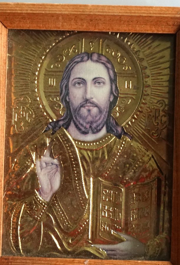 Gammal inglasad Jesus ikon med trä ram och hörn metall