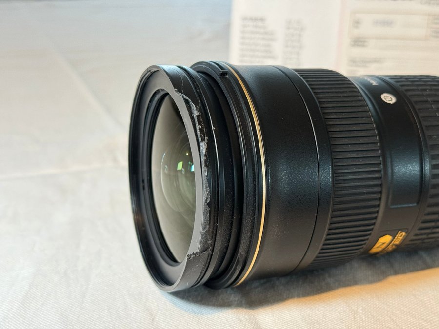 Nikon AF-S Nikkor 24-70mm f/28G ED Objektiv skadat men väl fungerande