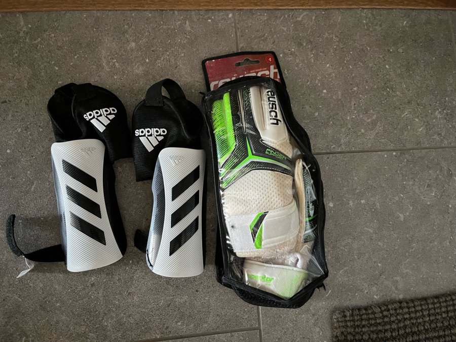 Reusch fotboll målvakt handskar goal keeper gloves storlek 4 och adidas benskydd