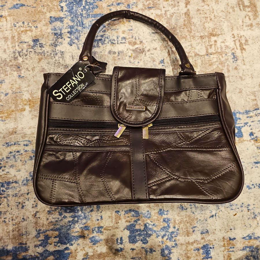 Stefano brun handväska med två handtag och avtagbar axelrem