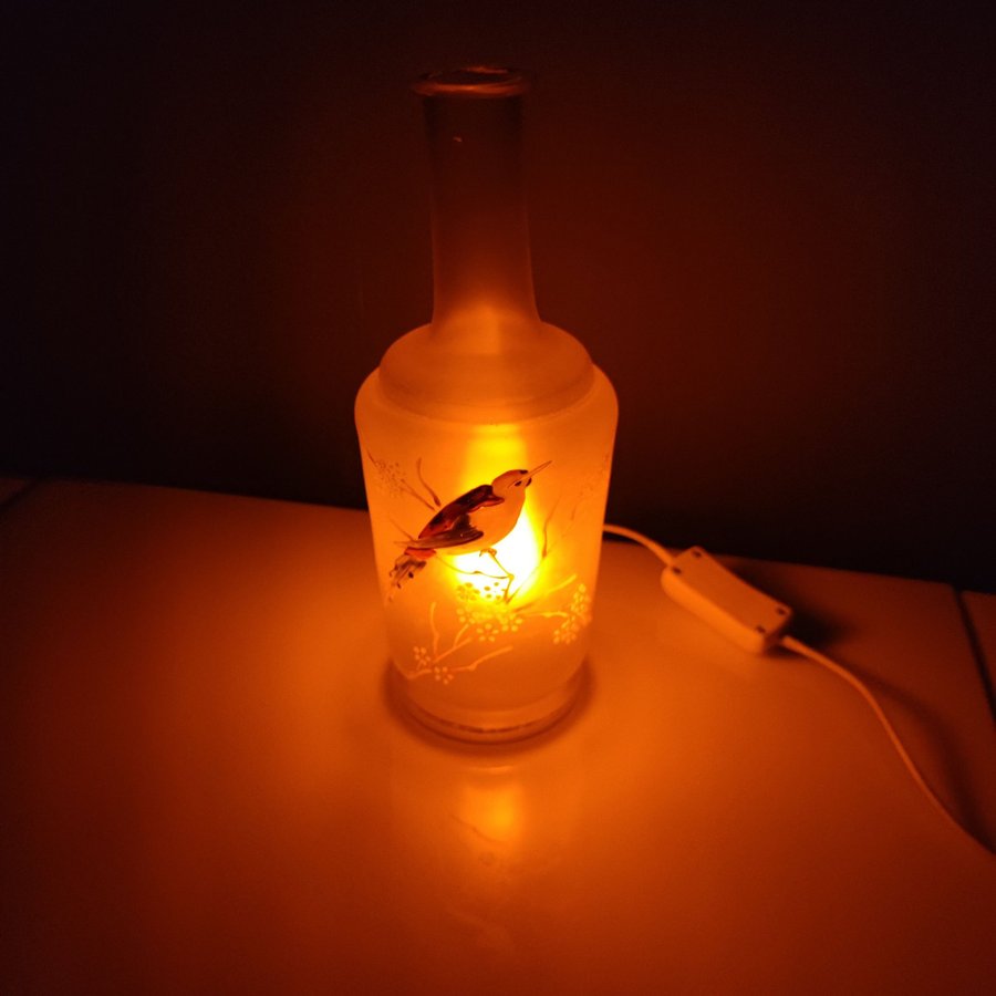 Konstgjord flamma - Eldflammor i flaska med målad fågel
