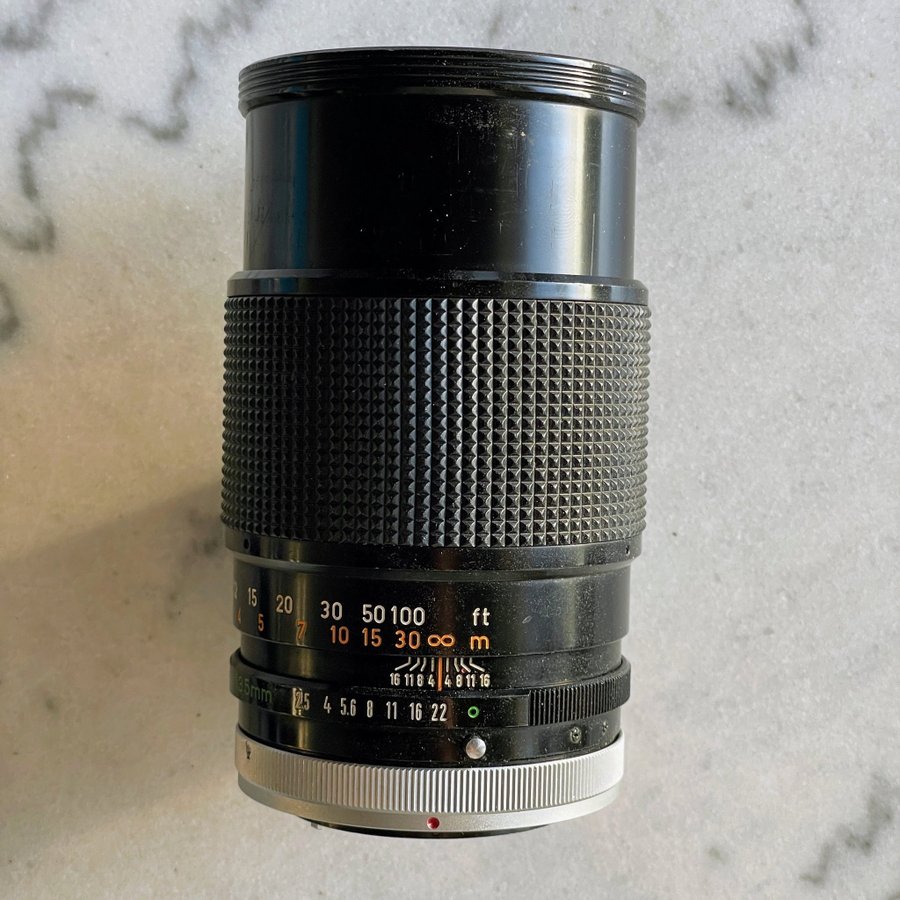 Canon FD 135mm f25 w/extendable lens hood + filter + case