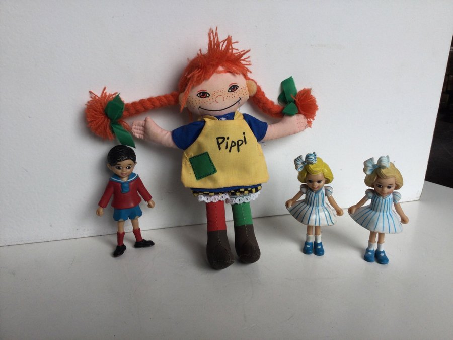 Pippi Långstrump docka och tre figurer Tommy och Annika