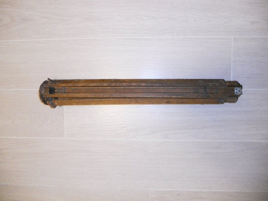 Vintage wooden tripod for the camera Antiques