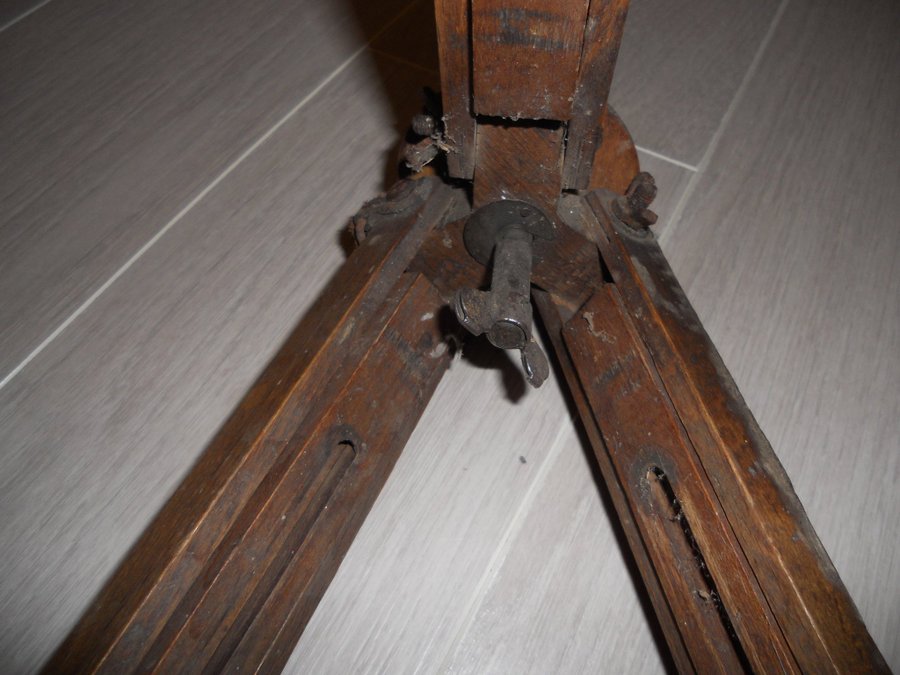 Vintage wooden tripod for the camera Antiques