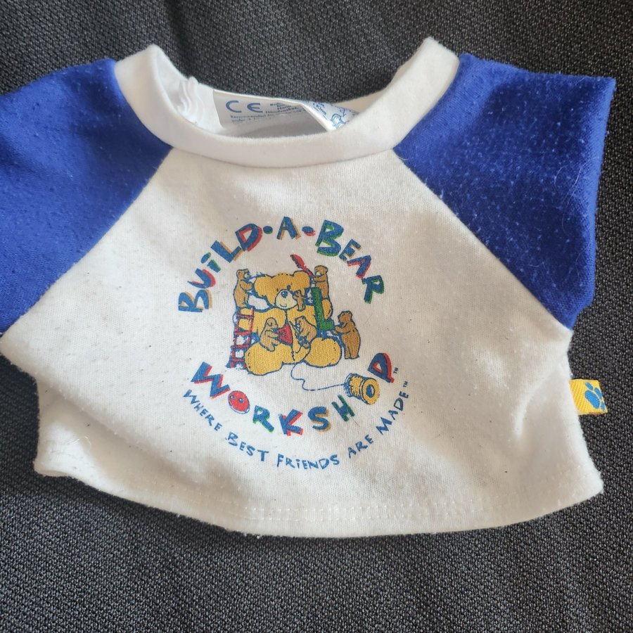 Build-a-bear Workshop vit med blåa ärmar t-shirt