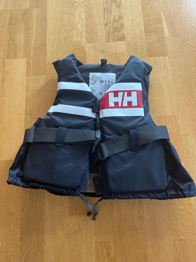 Helly Hansen mörkblå flytväst storlek XXS