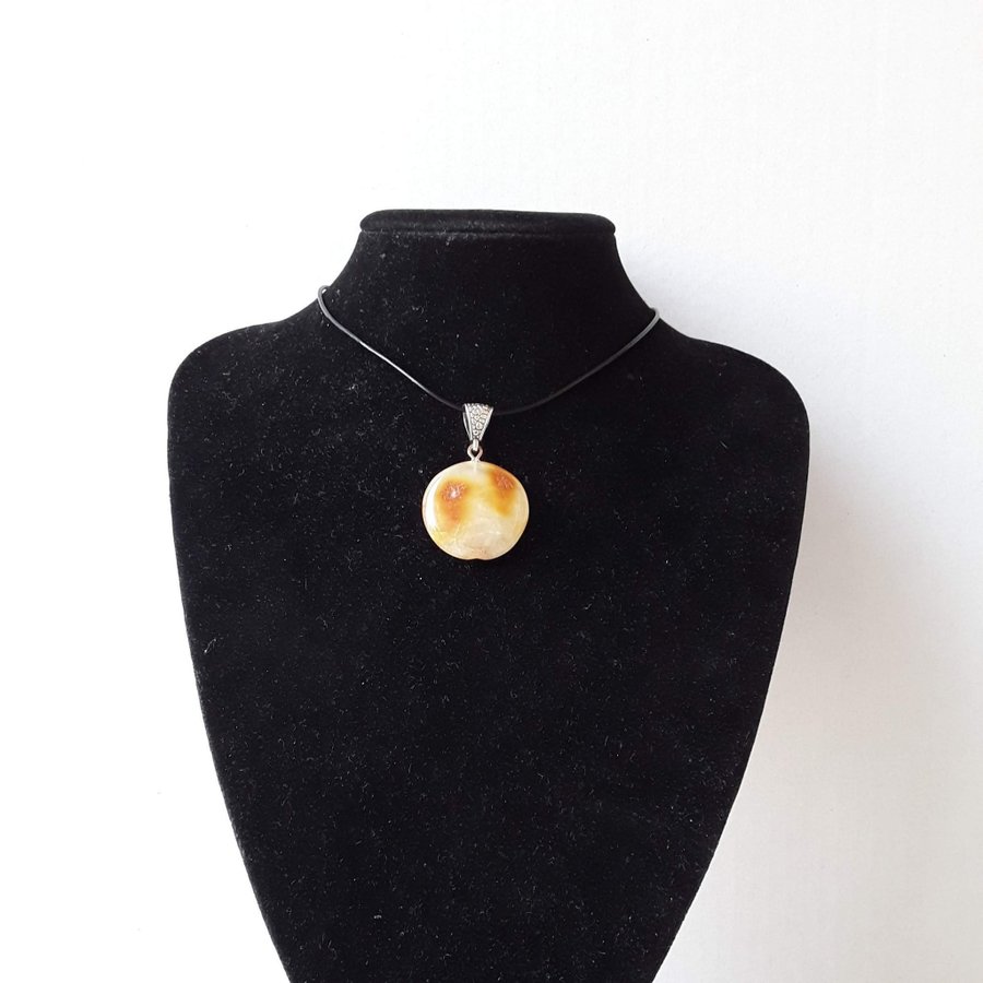 Baltic amber gem round circle yellow pendant on a black leather chain jewelry