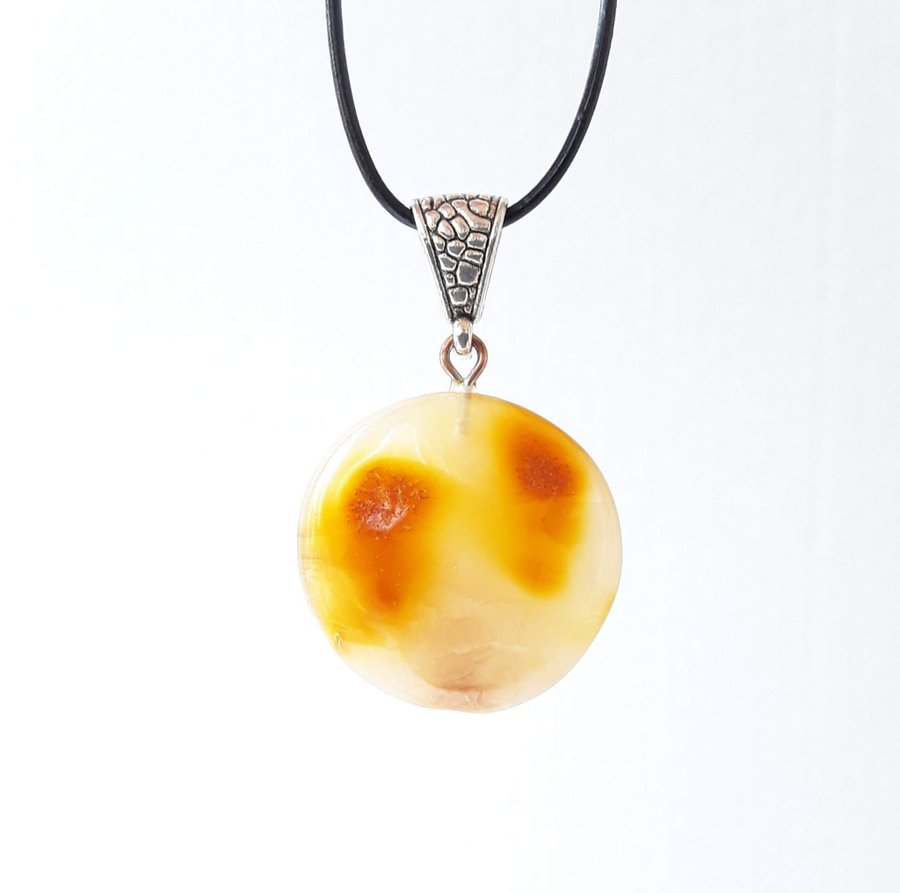 Baltic amber gem round circle yellow pendant on a black leather chain jewelry