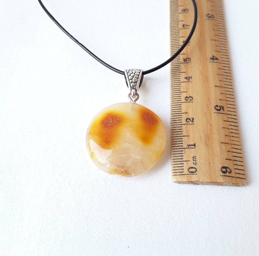 Baltic amber gem round circle yellow pendant on a black leather chain jewelry