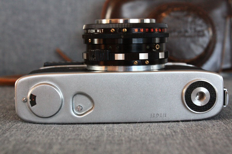 Minolta AL Rokkor 45 mm f/2 with original camera case Serviced