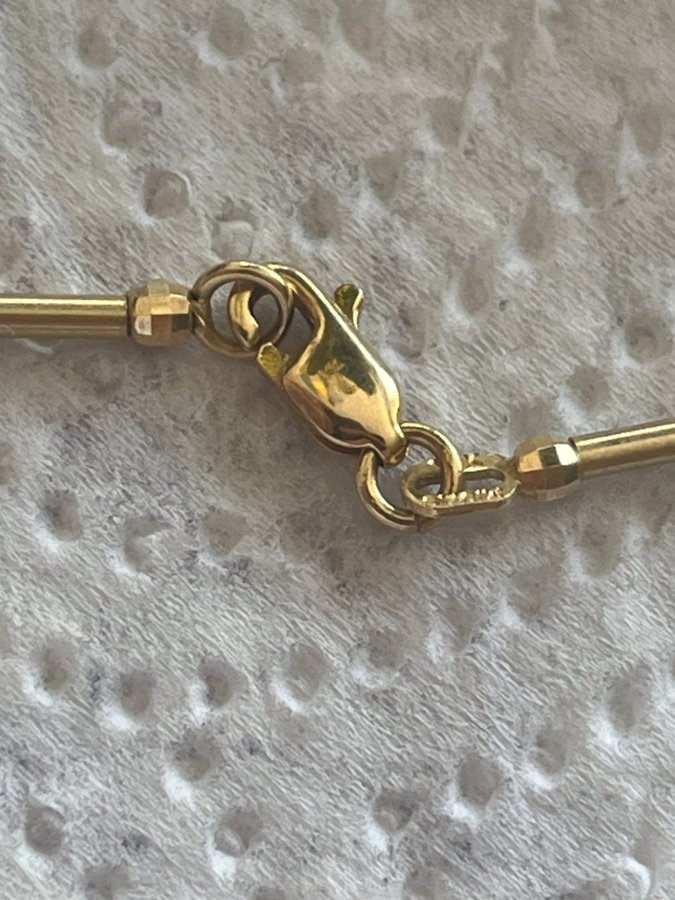 Halsband med delfin hänge 14k guld