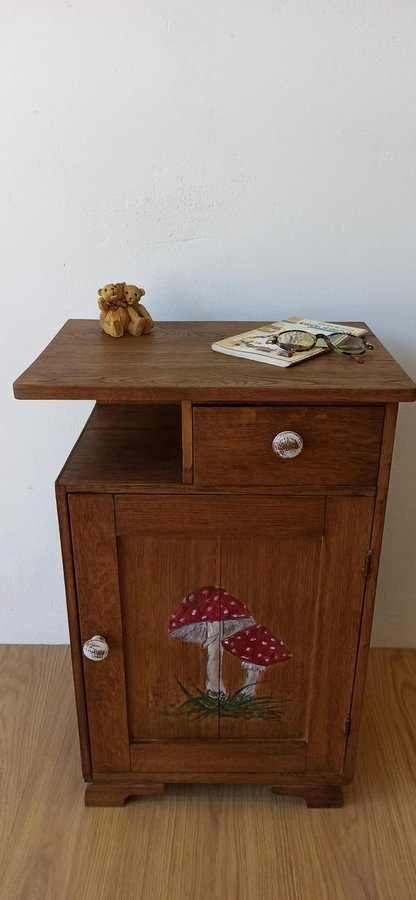 Vintage Wooden Cabinet with Mushroom Design.