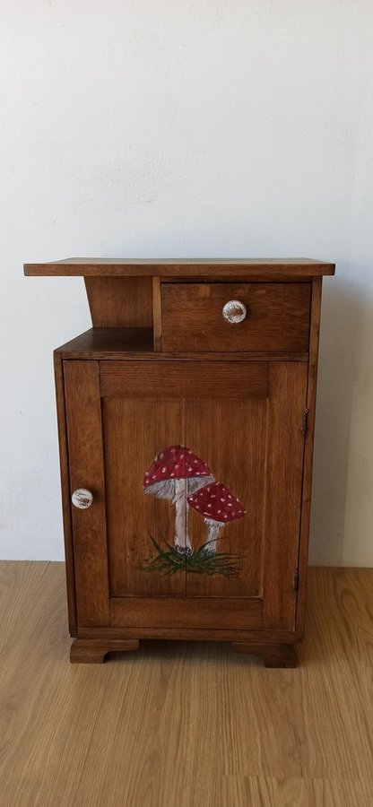 Vintage Wooden Cabinet with Mushroom Design.