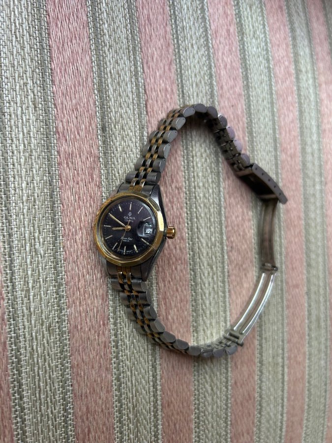 Vintage Olma Quartz armbandsur Seven Seas , Swiss made vintage