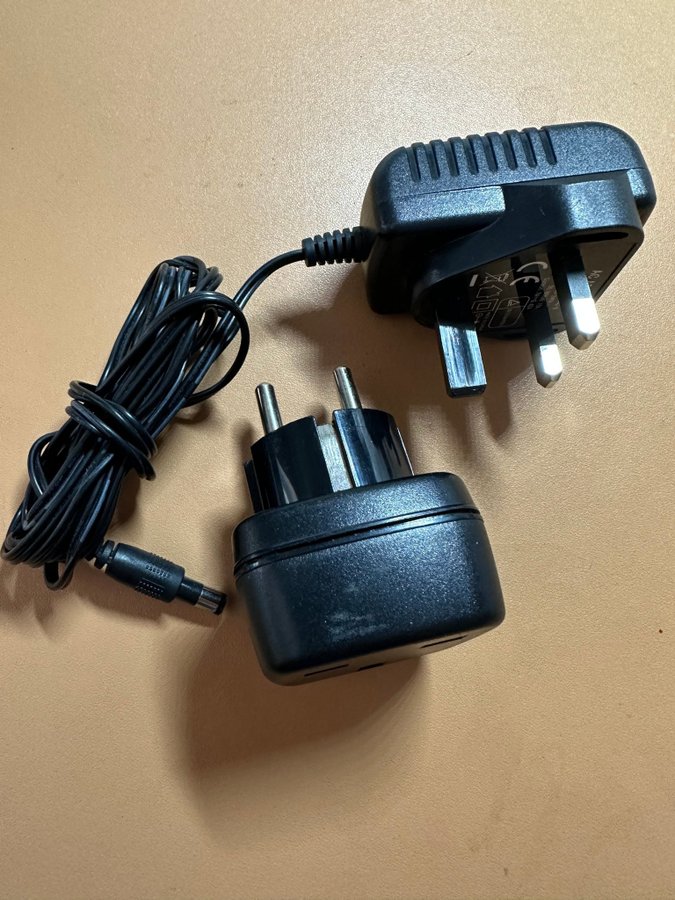 7 volts DC kontakt 0.42A med adapter