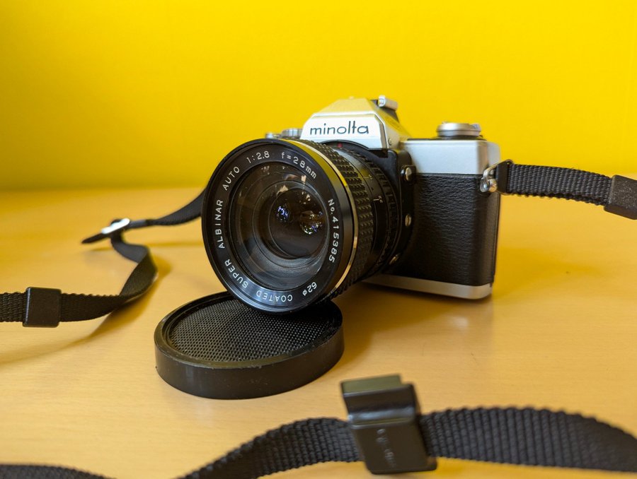 Minolta XG-1 camera with 28mm f2.8 Super Albinar wide-angle lens