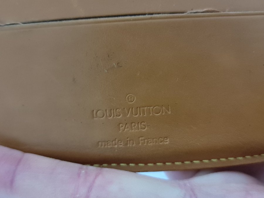 Louis Vuitton plånbok med kvitto