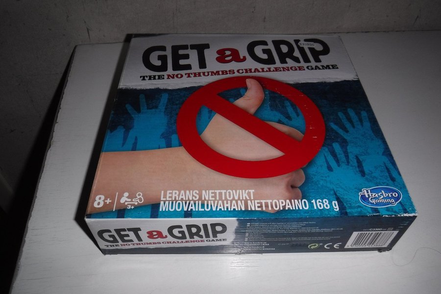 Nytt Inplastat Spelet Get a Grip the no Thumbs challange game från Hasbro gaming