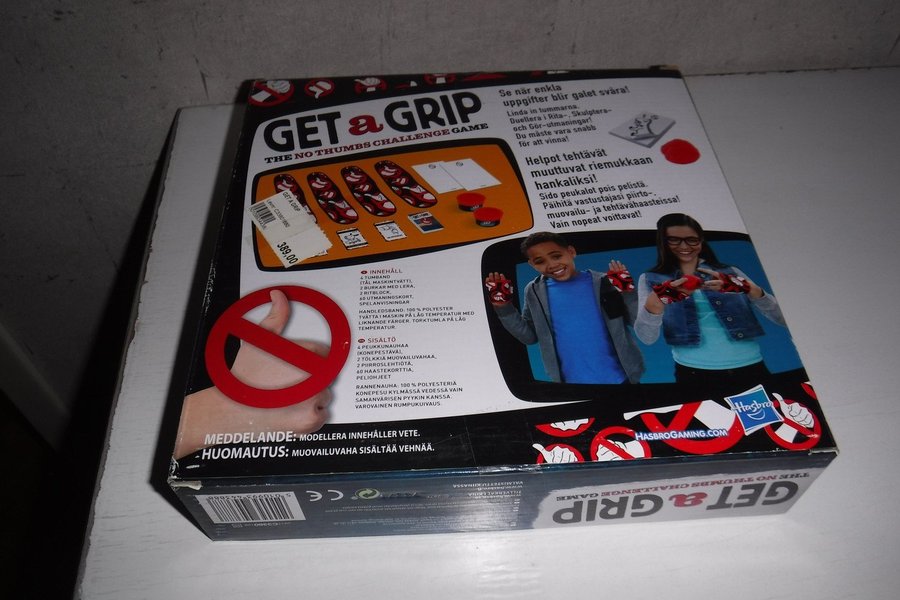 Nytt Inplastat Spelet Get a Grip the no Thumbs challange game från Hasbro gaming