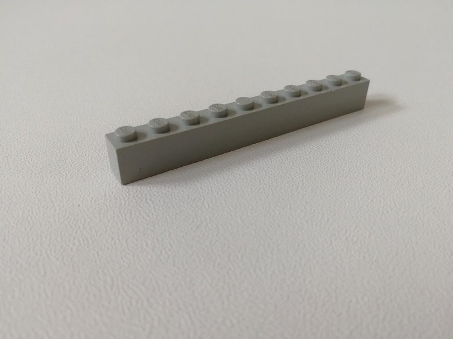 Lego - bit - brick - bas - 1x10 - part 6111 - ljusgrå (old light gray)