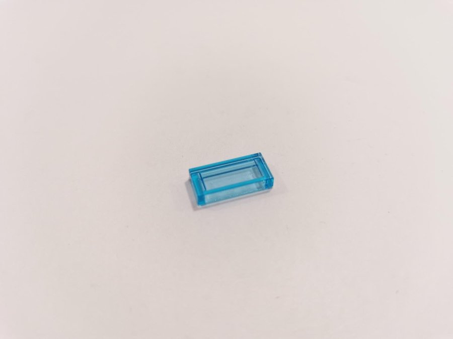 Lego - transparent - tile - 1x2 - part 3069b - ljusblå (trans light blue)