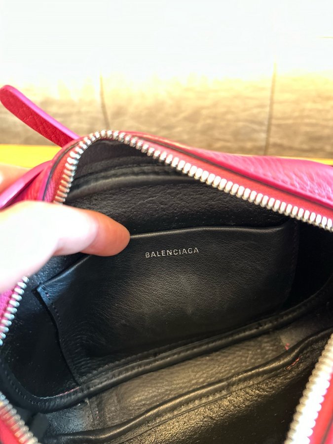 Balenciaga crossbody bag in dark pink leather