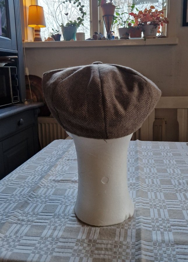 Fiskbensmönstrad keps i ull, flatcap, newsboy från Jaxon one-size.