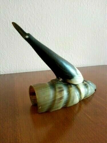 Vintage figure of bird, sculpture, statuette of a horn