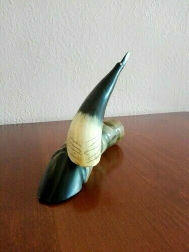 Vintage figure of bird, sculpture, statuette of a horn