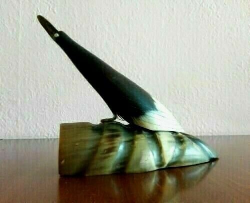 Vintage figure of bird, sculpture, statuette of a horn