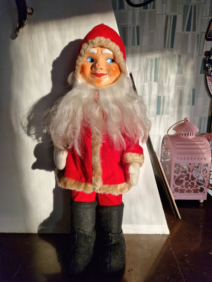 Retro vintage tomte i röd dräkt