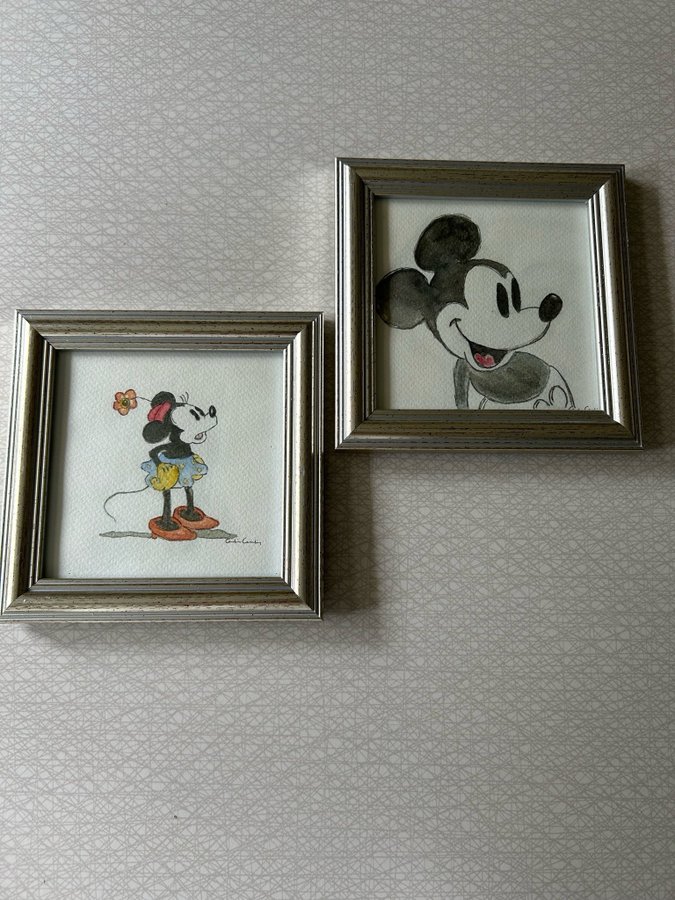 Tavlor med Mickey Mouse och Minnie Mouse