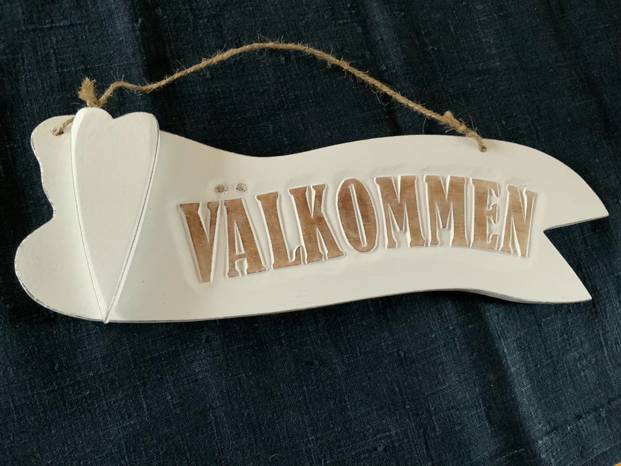 Välkomstskylt med hjärta