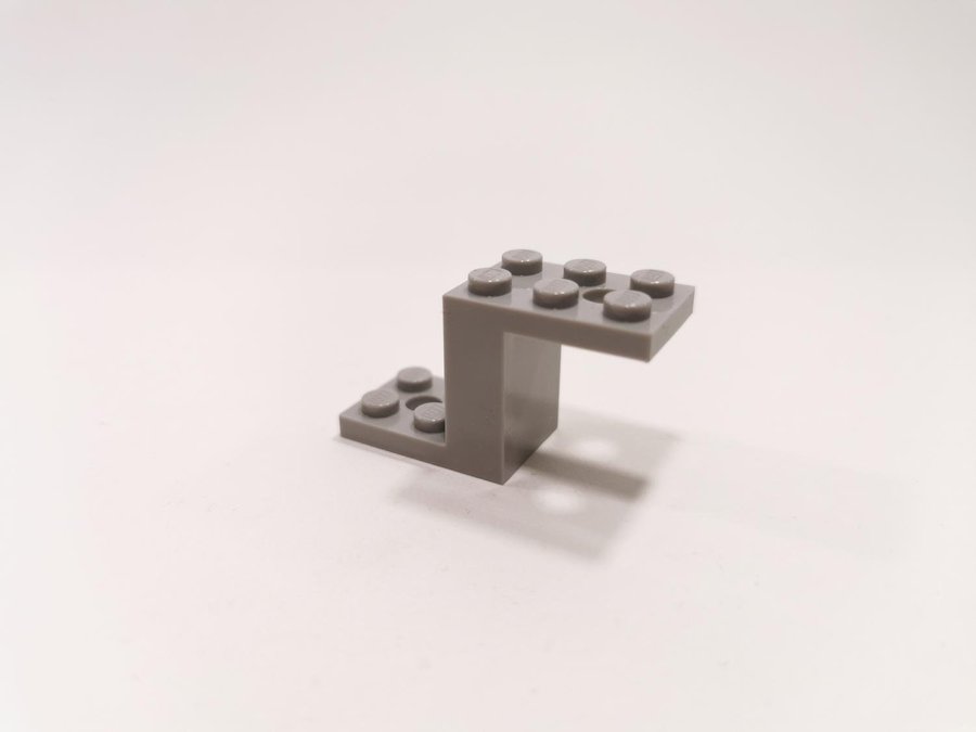 Lego - bracket - vinklad - 5x2x2 1/3 - part 6087 - ljusgrå (bluish)