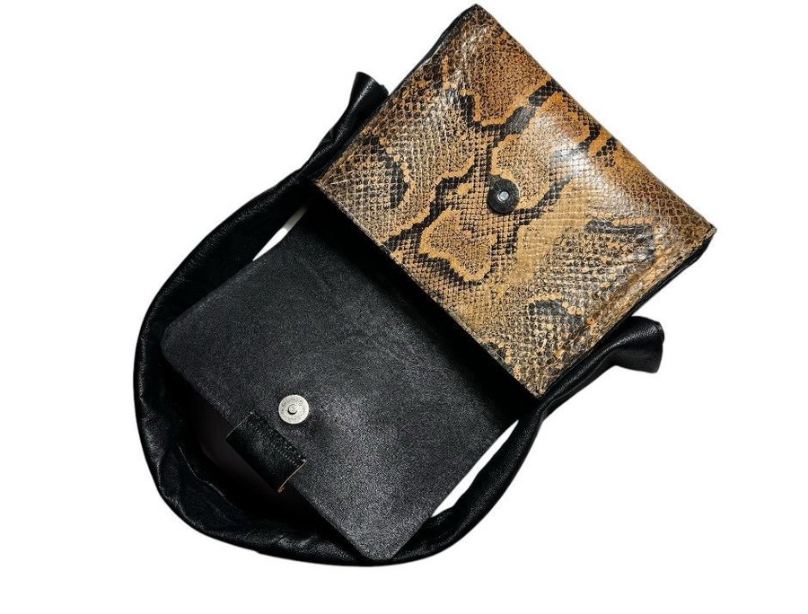 Handmade leather / upcycled python hand / wrist bag